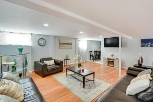 a living room with a couch and a table at Cozy Albany Vacation Rental about 5 Mi to Downtown! in Albany