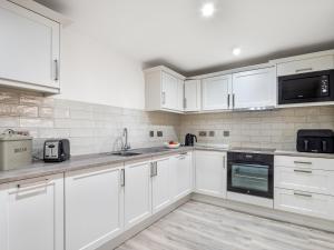 Dapur atau dapur kecil di Cleggan Pierside Apt 1