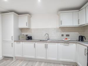 Dapur atau dapur kecil di Cleggan Pierside Apt 1