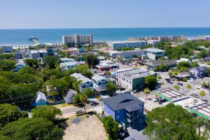 an aerial view of a city with the ocean at Folly Vacation Perfect Purple Palace Apt C in Folly Beach +21 photos