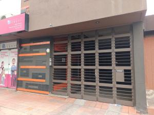 a store front with a bunch of glass doors at Departamento Mamá Lucia in Guaymallen