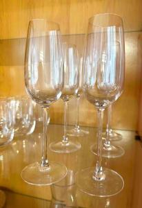 a group of wine glasses sitting on a table at Apartamento St Agustí - Centro in Mataró