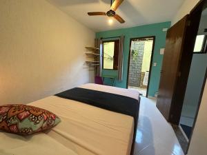 Postel nebo postele na pokoji v ubytování Maresia Hostel Paraty BR