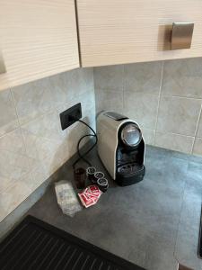 a toaster sitting on a counter in a kitchen at La tana di Piozzo in Piozzo