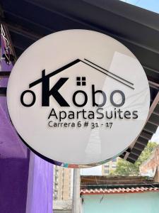 a sign for a kota appliances center at a store at Súper Apartamento central en Casa Colonial Bogotá in Bogotá