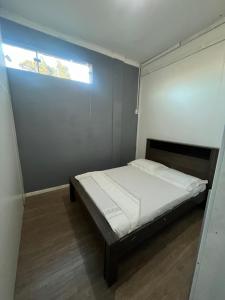 Postel nebo postele na pokoji v ubytování Quarto Hostel Curitiba