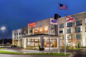 a rendering of the front of a hotel at Hampton Inn & Suites Saraland Mobile in Saraland