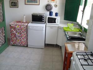 Kuchyň nebo kuchyňský kout v ubytování La tenuta Jucci + 8 fotografií