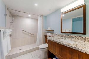 a bathroom with a sink and a shower and a toilet at Hilton Vacation Club Royal Palm St Maarten in Simpson Bay