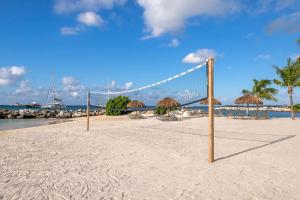 a volley ball net on a sandy beach at Hilton Vacation Club Royal Palm St Maarten in Simpson Bay