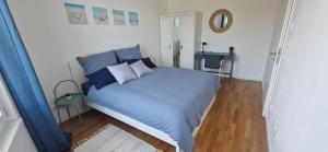 Cama ou camas em um quarto em Cosy flat in Munich Neuhausen