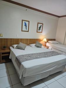 Cama ou camas em um quarto em GOLDEN DOLPHIN Resort - Grand & Express - Caldas Novas - COM TV A CABO - Aguas Termais