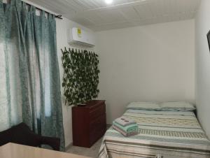 Katil atau katil-katil dalam bilik di El Hogar de Ami