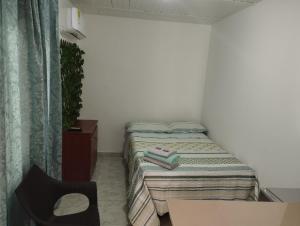 Voodi või voodid majutusasutuse El Hogar de Ami toas