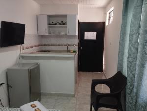 Dapur atau dapur kecil di El Hogar de Ami