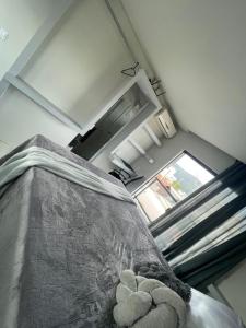 Postel nebo postele na pokoji v ubytování Loft proximo a diversas praias
