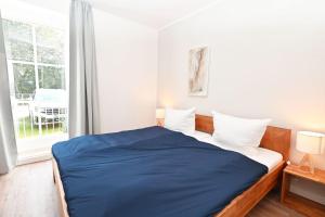 Postel nebo postele na pokoji v ubytování Meer-Natur