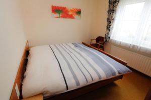 Postel nebo postele na pokoji v ubytování Meyer Appartments