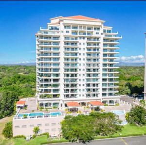 an aerial view of a large white building at Apa in San Carlos