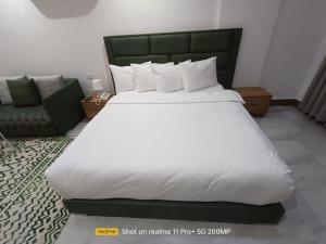 Un pat sau paturi într-o cameră la Hotel Sand View