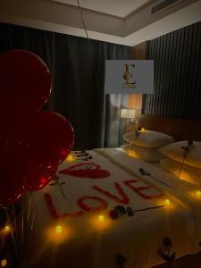 Postel nebo postele na pokoji v ubytování E Hotel