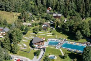 an aerial view of a resort with a swimming pool at Ferienhaus Aigner in Sankt Michael im Lungau