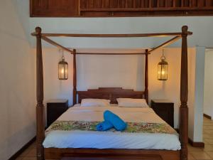 Кровать или кровати в номере Shanti Ghar Guest House