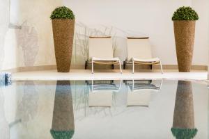Bazén v ubytování DAS BADL - Smart Retreat AO nebo v jeho okolí