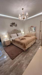 Ένα ή περισσότερα κρεβάτια σε δωμάτιο στο Complex Rediu 54-PentHouse +41 φωτογραφίες