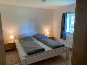 Katil atau katil-katil dalam bilik di Heuerhaus - Artlands Home- Landhaus für Familien und Gruppen