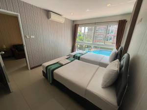Postel nebo postele na pokoji v ubytování H2DO Hotel + 37 fotografií