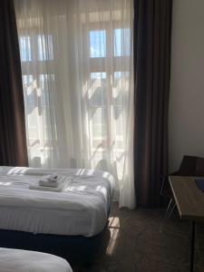 Riverside Hotel Plzeň客房内的一张或多张床位