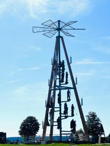 a group of people standing on top of a windmill at Ferienwohnung Johanngeorgenstadt in Johanngeorgenstadt +5 photos