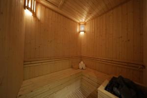 an empty sauna with a teddy bear sitting in it at The View Serviced Residence 豪景日式酒店公寓 in Phnom Penh