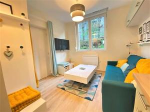 Μια τηλεόραση ή/και κέντρο ψυχαγωγίας στο Les appartements de la La perle du Laonnois
