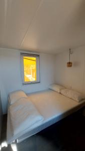 Camping Bella Vista客房内的一张或多张床位