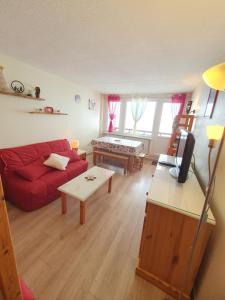 Posedenie v ubytovaní La Mongie, Studio pieds des pistes, parking intérieur privé