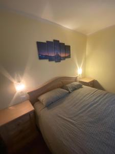Säng eller sängar i ett rum på Appartamento Ofelia