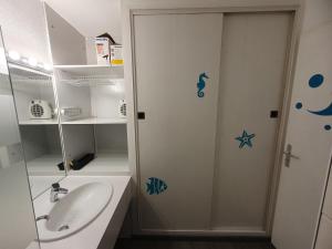 Kúpeľňa v ubytovaní La Mongie, Studio pieds des pistes, parking intérieur privé