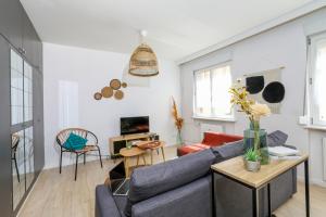 TV i/ili multimedijalni sistem u objektu Confort - Artémis - Centre Ville