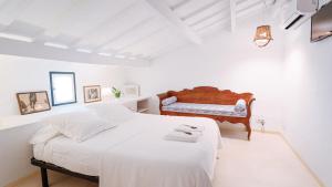 Postel nebo postele na pokoji v ubytování Menorca Agroturismo Llimpet + 37 fotografií