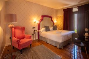 Postel nebo postele na pokoji v ubytování Hotel Don Juan Boutique
