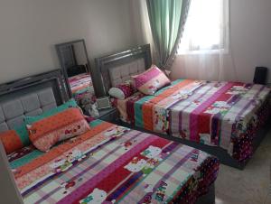 Postel nebo postele na pokoji v ubytování Holiday Inn fayoum