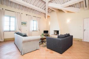 Posezení v ubytování Luxury Resort with swimming pool in the Tuscan countryside, apartments with private outdoor area with panoramic view