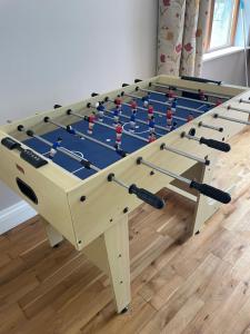 a large foosball table in a room at Creevagh Cottage in Castlebar