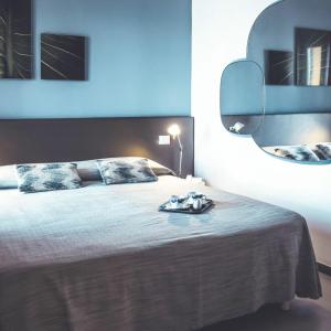 Voodi või voodid majutusasutuse Hotel Marina Piccola toas