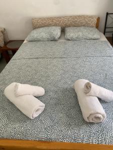 Postel nebo postele na pokoji v ubytování Poudras Amazing View Caldera