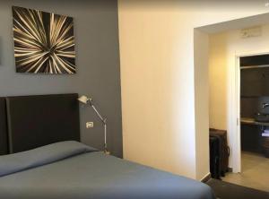 Voodi või voodid majutusasutuse Hotel Marina Piccola toas