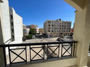a view of a city from a balcony at Apartment Hossam 1 in Hurghada