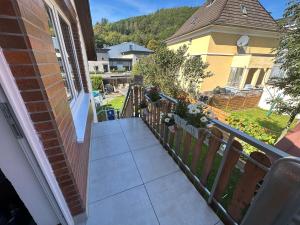 a balcony of a house with a fence at Sauerlandapartment Vivien in Plettenberg